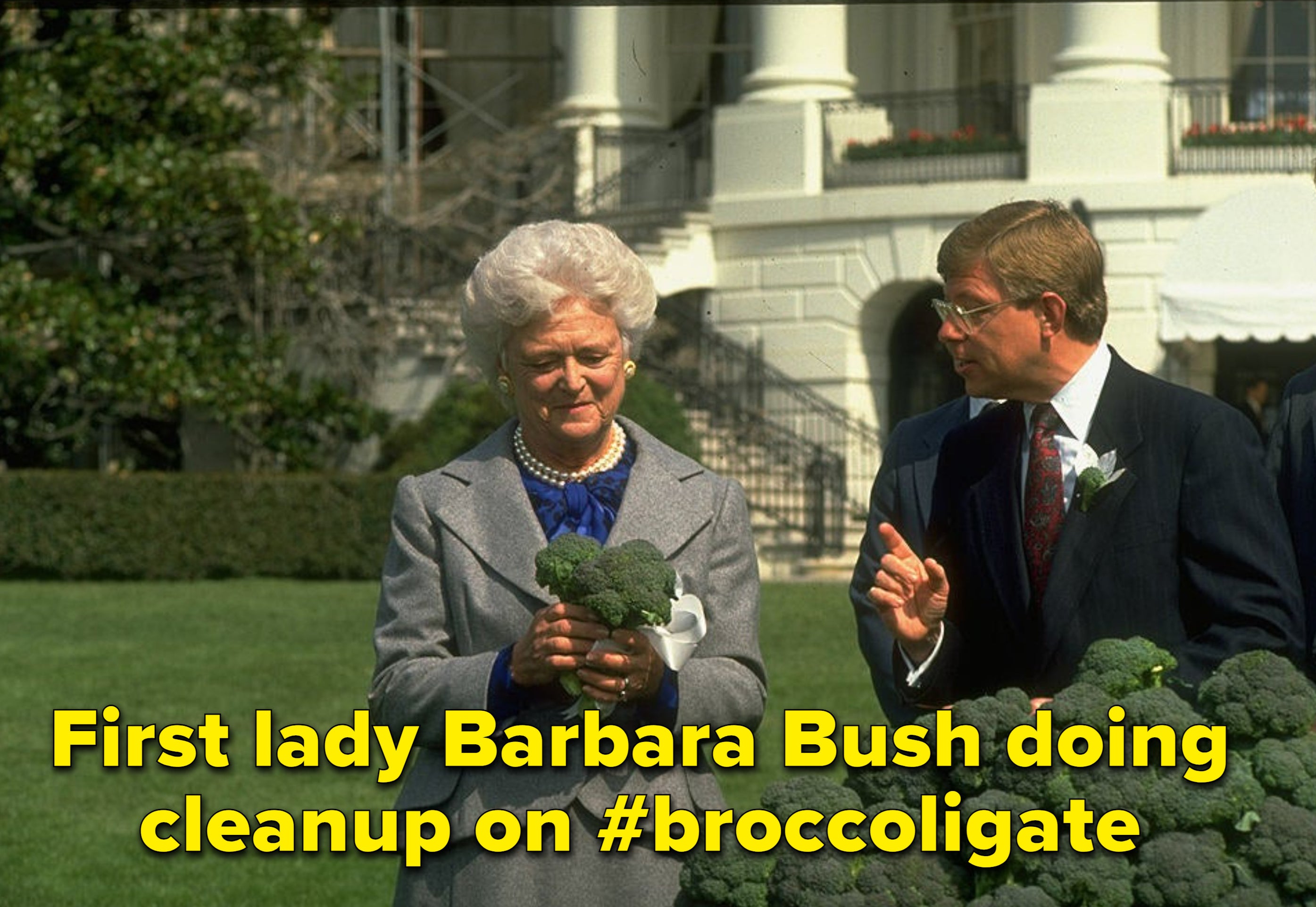 First lady barbara bush holds broccoli at a press conference trying to fix her husband&#x27;s faux paus