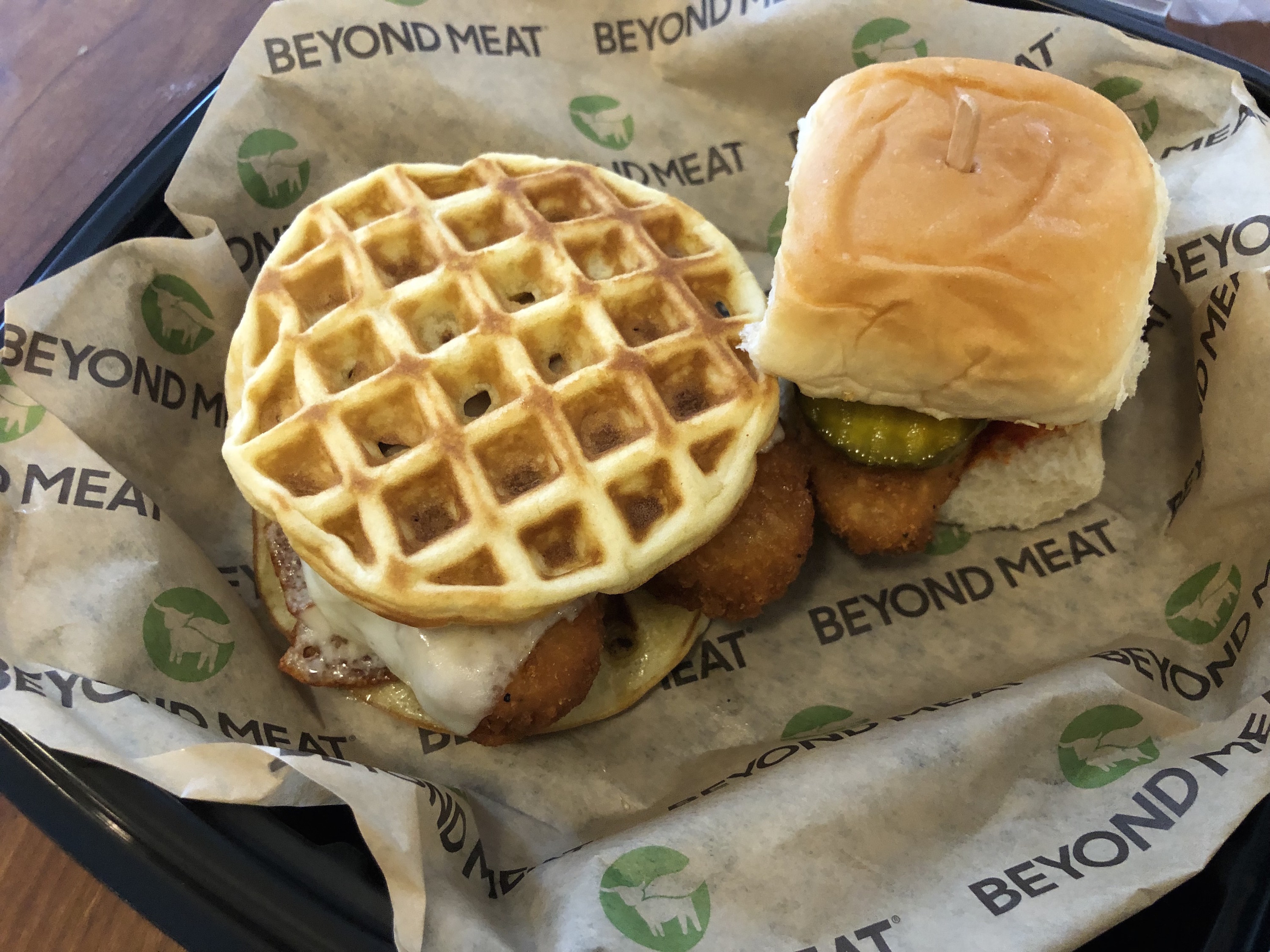 a chicken and waffle sandwich and a buffalo slider