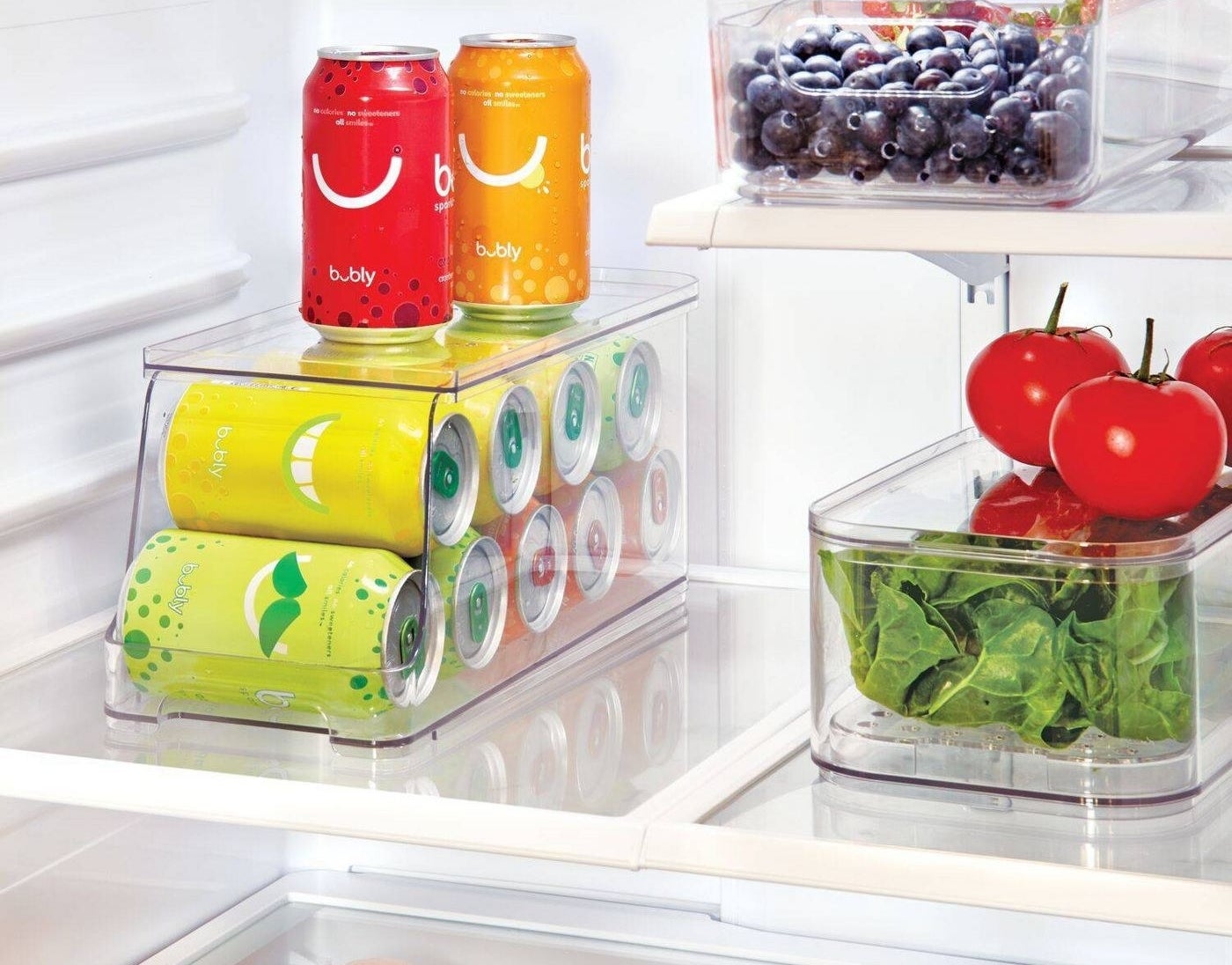 a refrigerator with a soda organizer and sodas inside