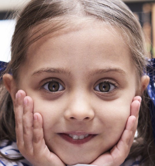 A toddler's face, staring