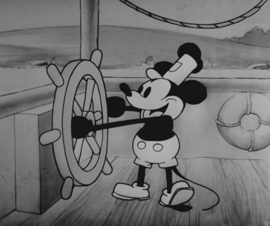 Mickey Mouse driving a river boat