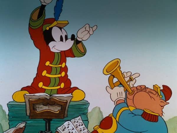 Mickey Mouse directs an orchestra