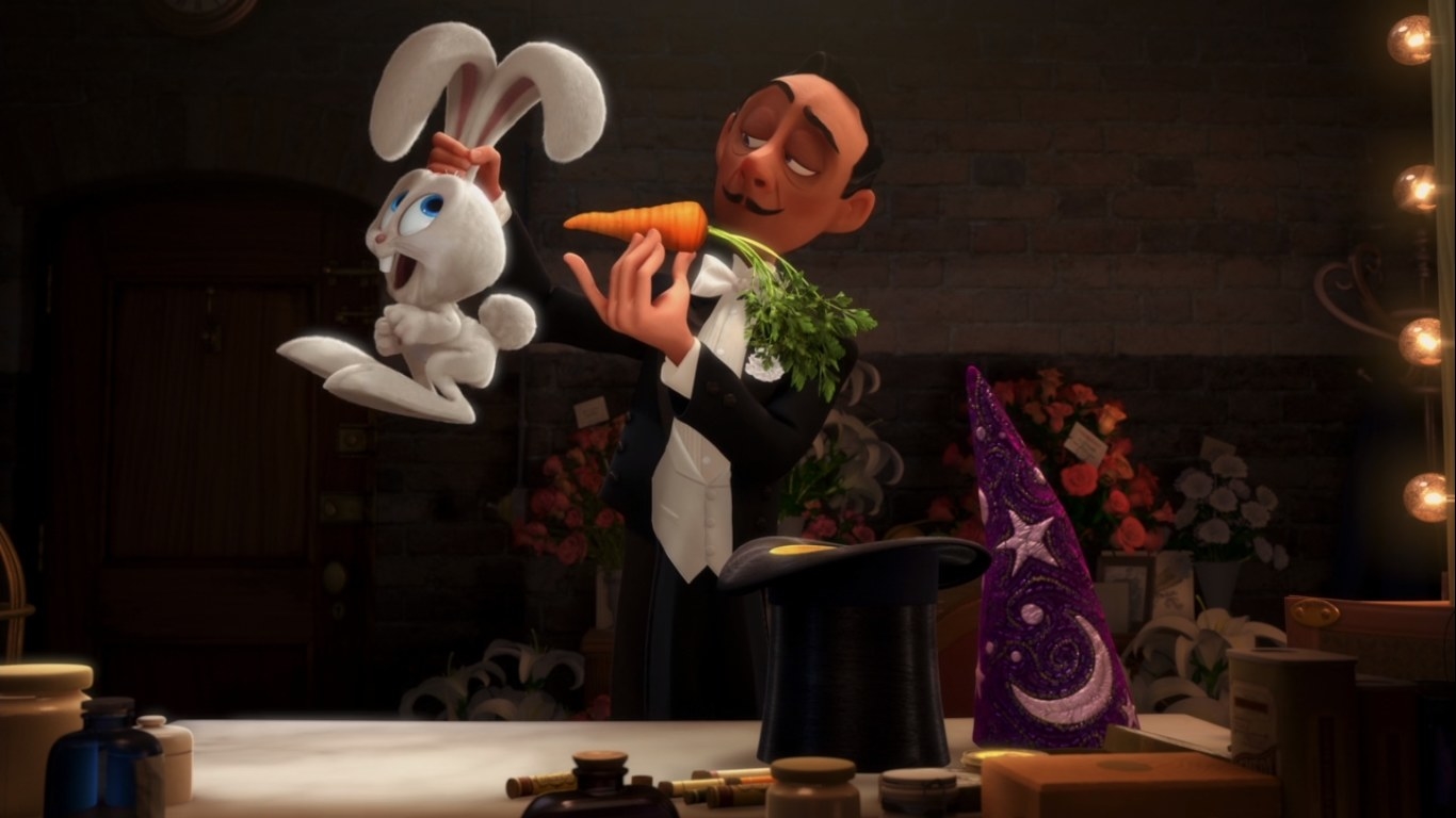 A magician attempts to feed a rabbit a carrot
