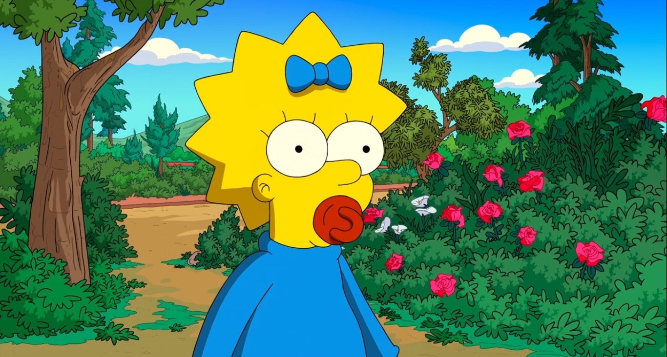 Maggie Simpson in a garden. 