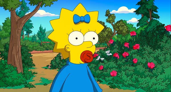 Maggie Simpson in a garden