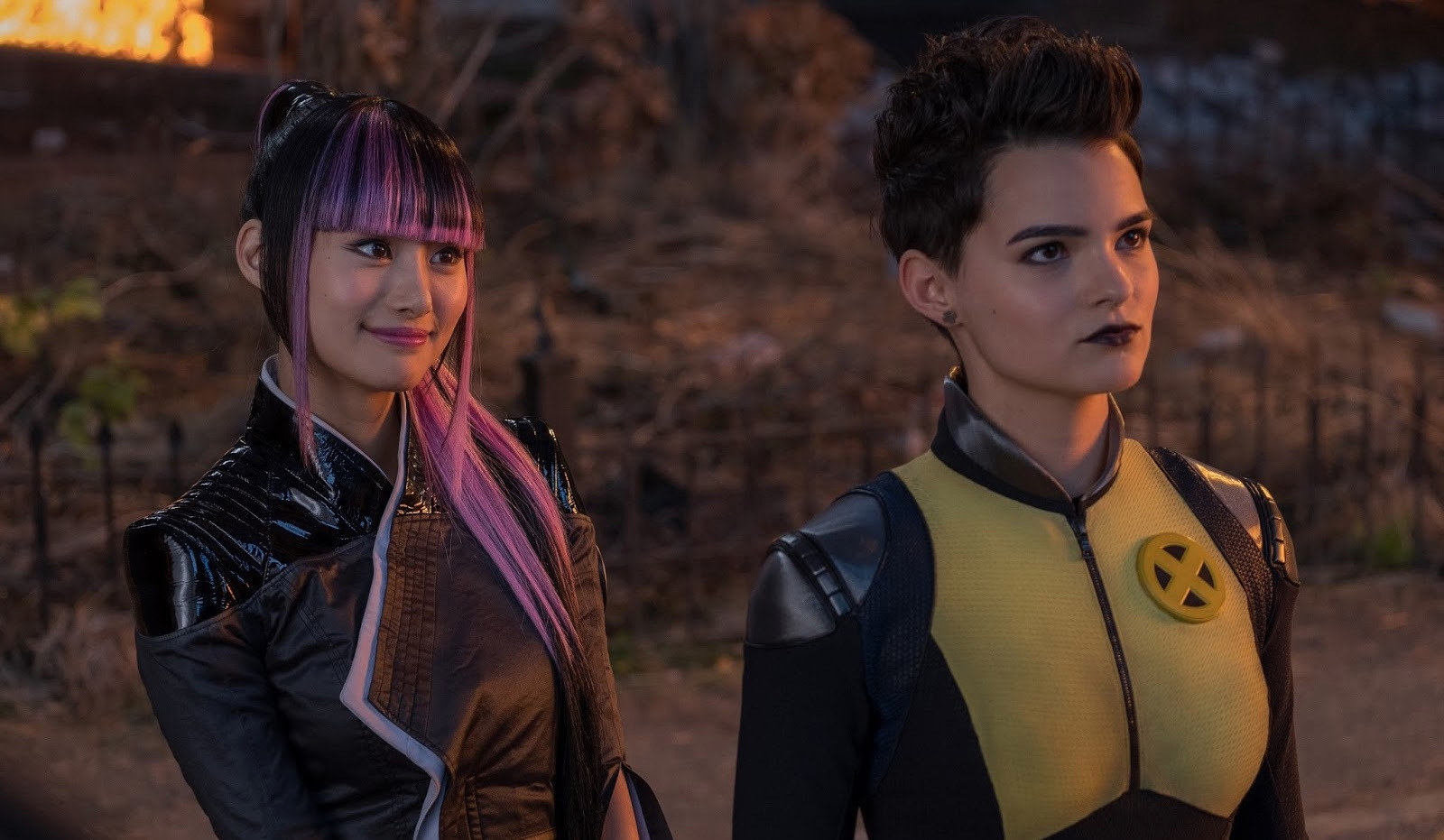 Negasonic Teenage Warhead and Yukio stand next to each other