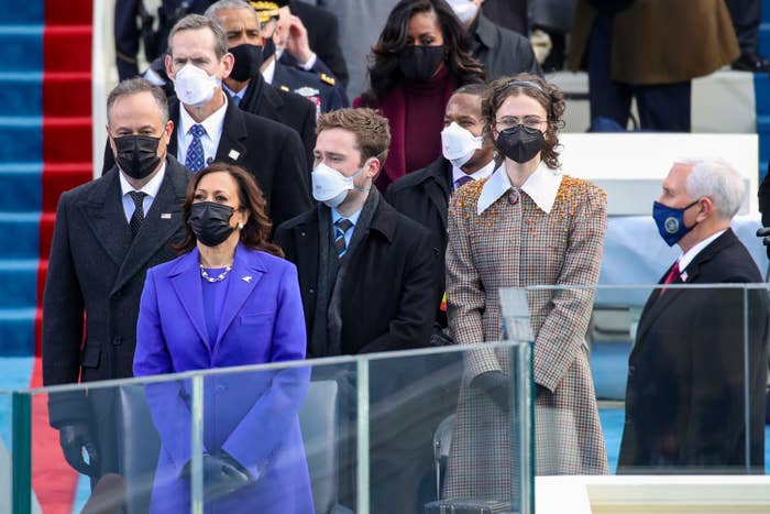 Vice President Elect Kamala Harris, Cole Emhoff, Ella Emhoff, and Vice President Mike Pence stand at the inauguration of U.S. President-elect Joe Biden on the West Front of the U.S. Capitol on January 20, 2021 in Washington, DC