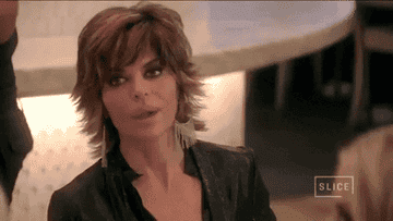 Lisa Rinna licks her lips and makes a confused face on set of &quot;Real Housewives of Beverly Hills&quot;