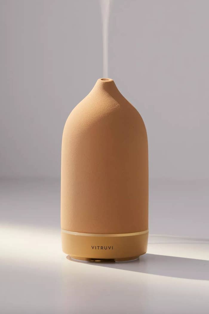 the Vitruvi essential oil diffuser in gold