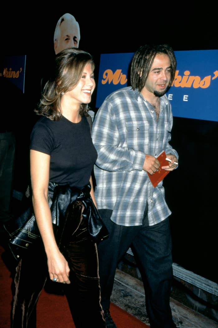 American actress Jennifer Aniston and American musician Adam Duritz attend the &quot;Mr. Jenkins Soiree&quot; at the Ace Gallery Los Angeles on September 29, 1995 in Los Angeles, California