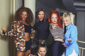 Melanie Brown, Melanie Chisholm, Victoria Beckham, Geri Halliwell, and Emma Bunton pose together as The Spice Girls.