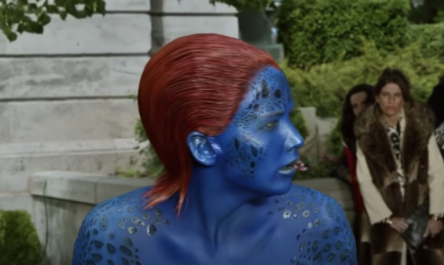 Jennifer Lawrence as Mystique with poorly slicked back orange hair