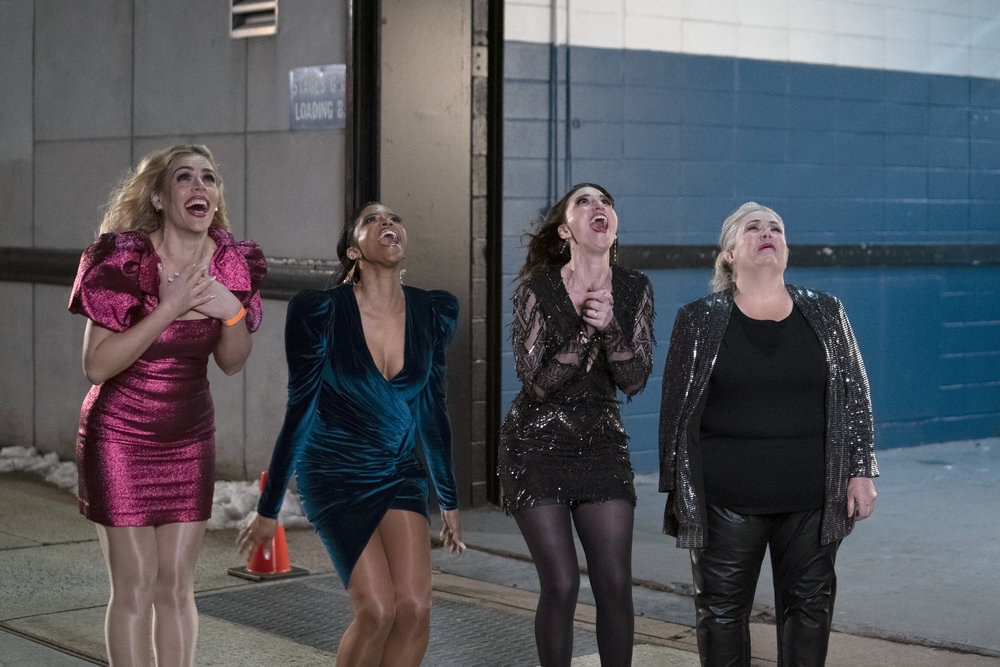 Busy Philipps, Renée Elise Goldsberry, Sara Bareilles, and Paula Pell look up into the sky and scream
