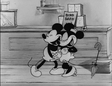 Mickey and Minnie dance together