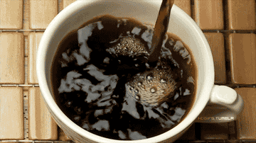 Coffee being poured into a mug