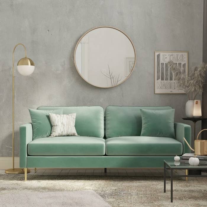 Green couch in living room