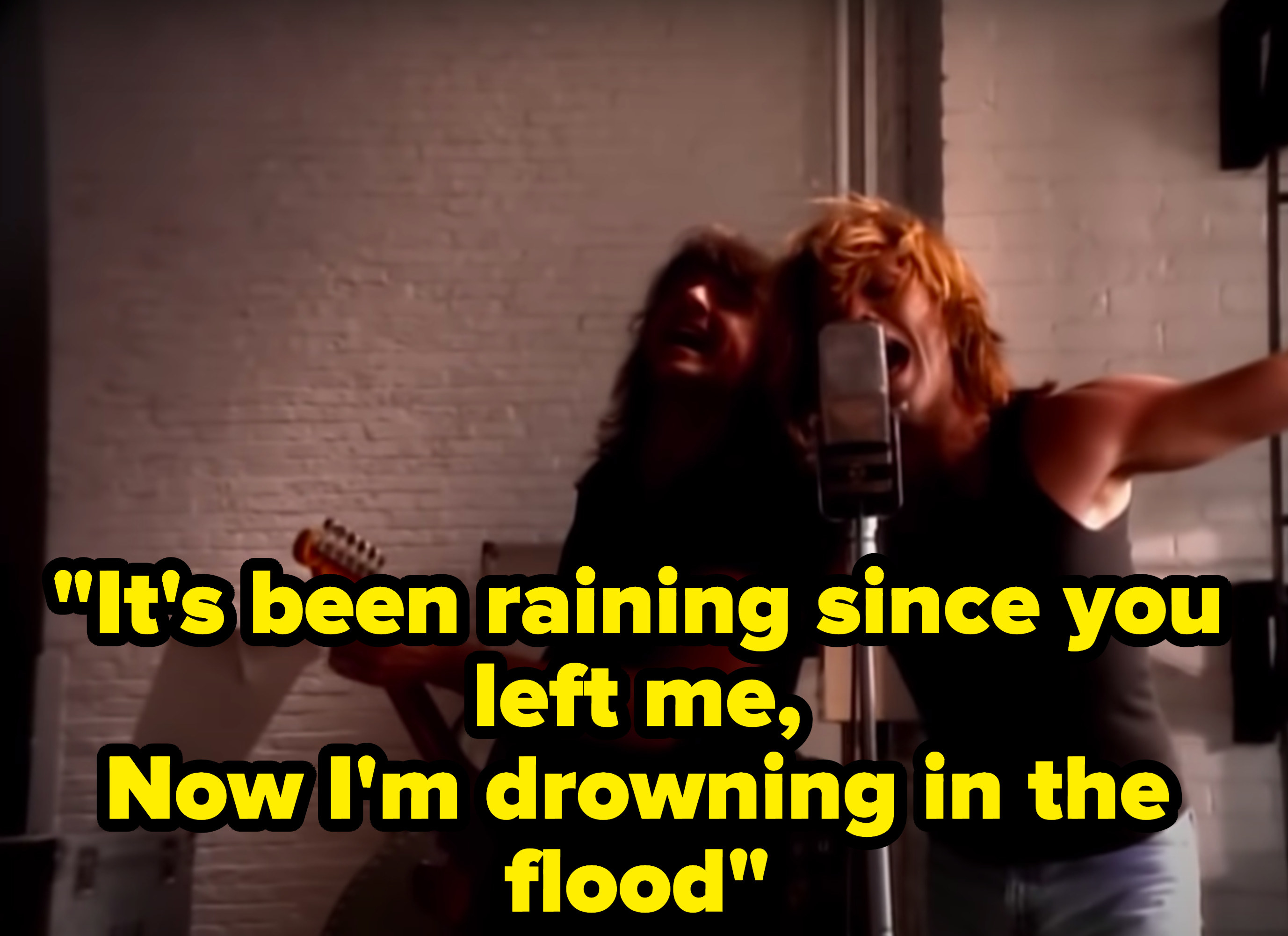 Still from the music video with the lyric: &quot;&quot;It&#x27;s been raining since you left me, Now I&#x27;m drowning in the flood&quot;
