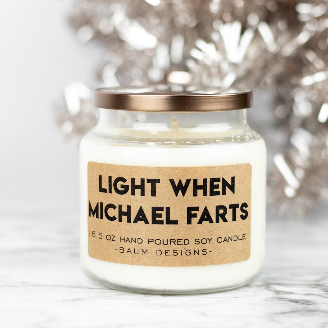 glass candle that says light when michael farts