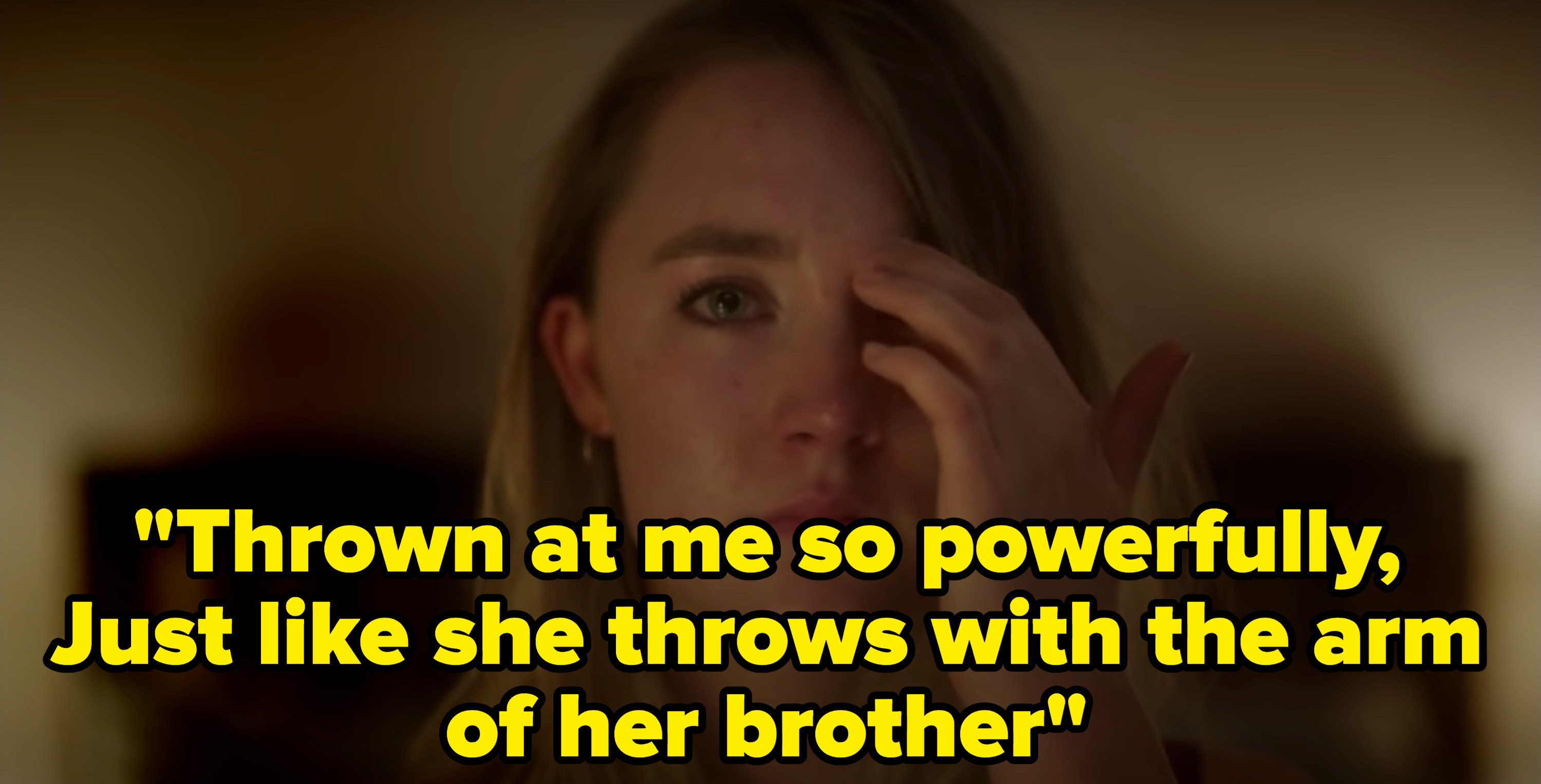 Still from the music video with the lyric: &quot;Thrown at me so powerfully, Just like she throws with the arm of her brother&quot;