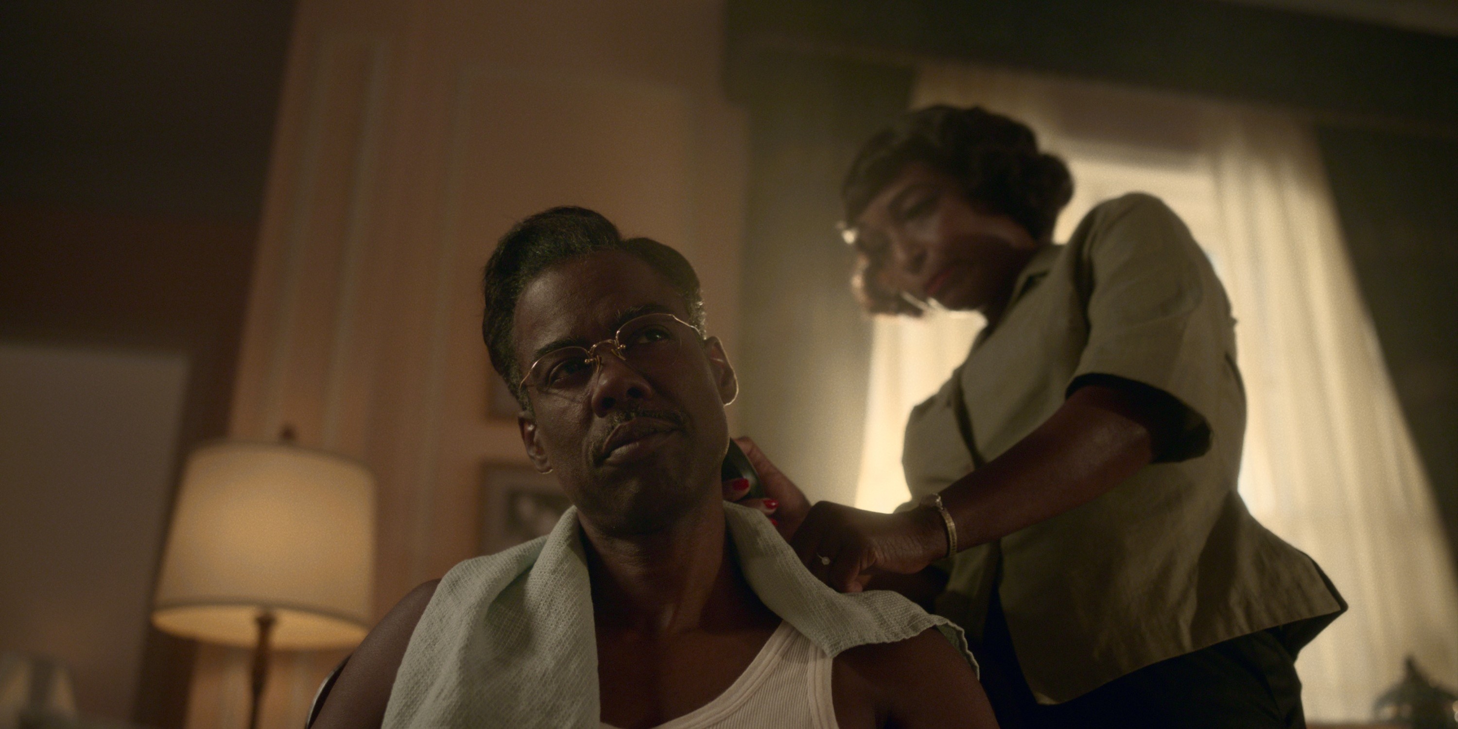 J. Nicole Brooks giving Chris Rock a haircut