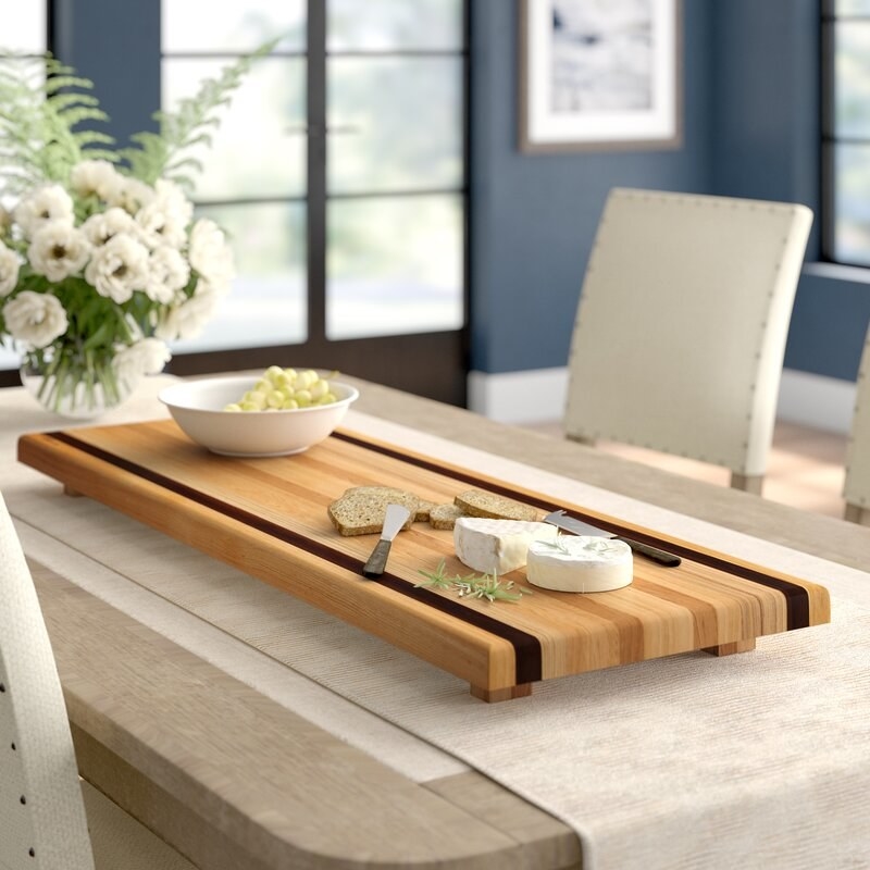 The cheeseboard on a dining room table
