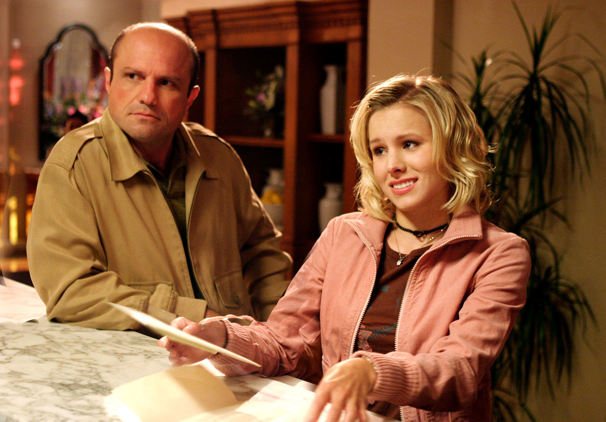Enrico Colantoni and Kristen Bell looking confused