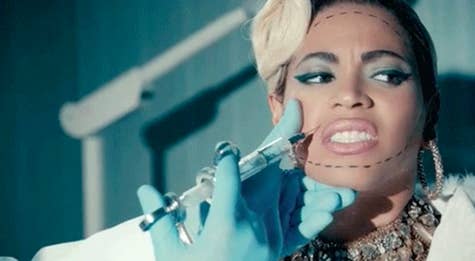 Beyoncé in her &quot;Pretty Hurts&quot; music video pretending to have plastic surgery