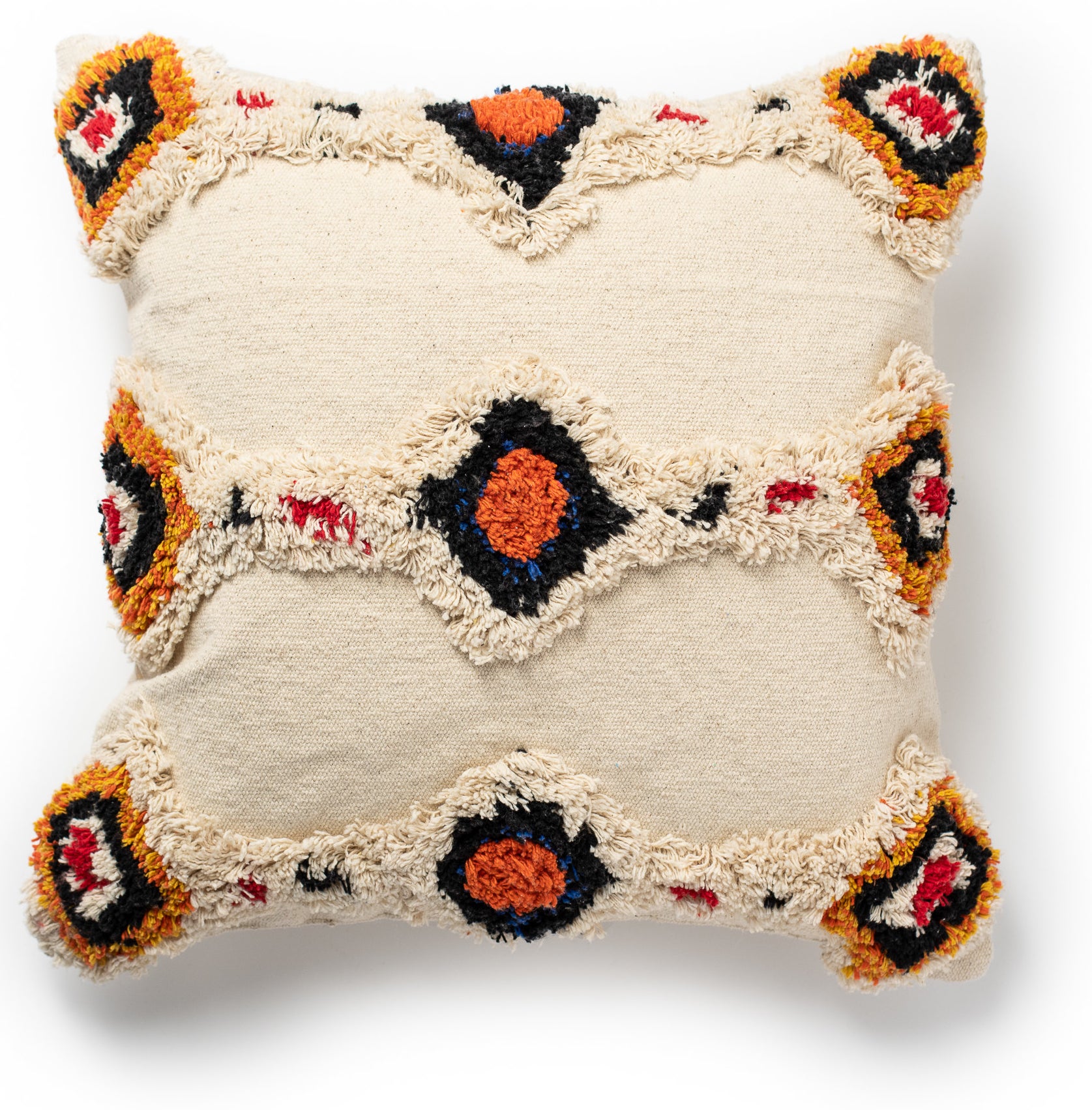 The off-white pillow with blue, red, and yellow chenille accents