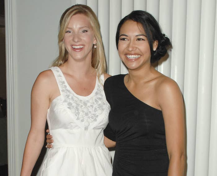 Naya puts her arm around Heather while they smile during an event many years ago