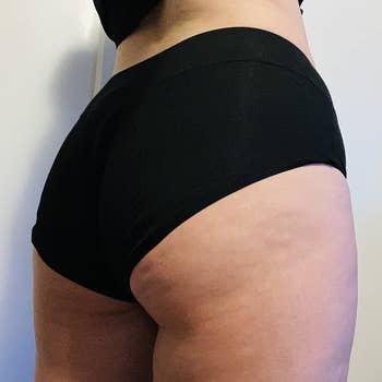 a reviewer photo of the back view of someone wearing the underwear 