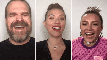 A gif of David Harbour, Scarlett Johansson, and Florence Pugh laughing