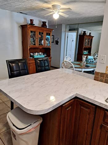 same reviewer showing countertop wholly covered successful marble interaction insubstantial