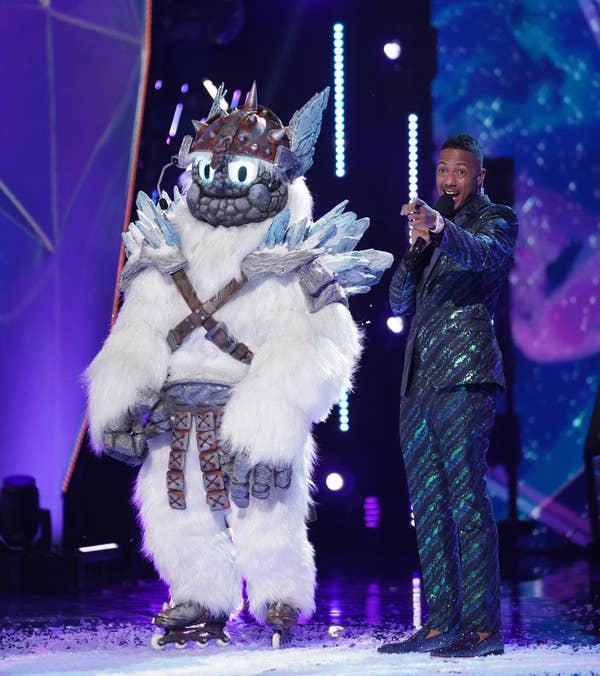 A scene from The Masked Singer with Nick Cannon and the Yeti
