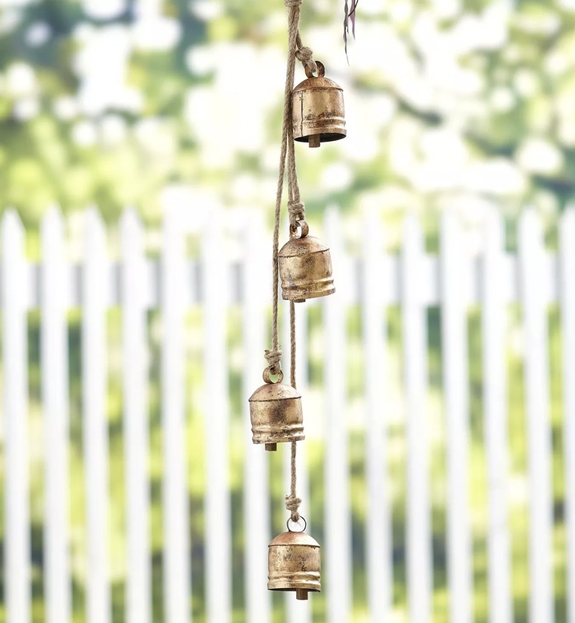 a set of brass bell wind chimes