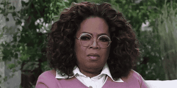 Oprah shakes her head in shock