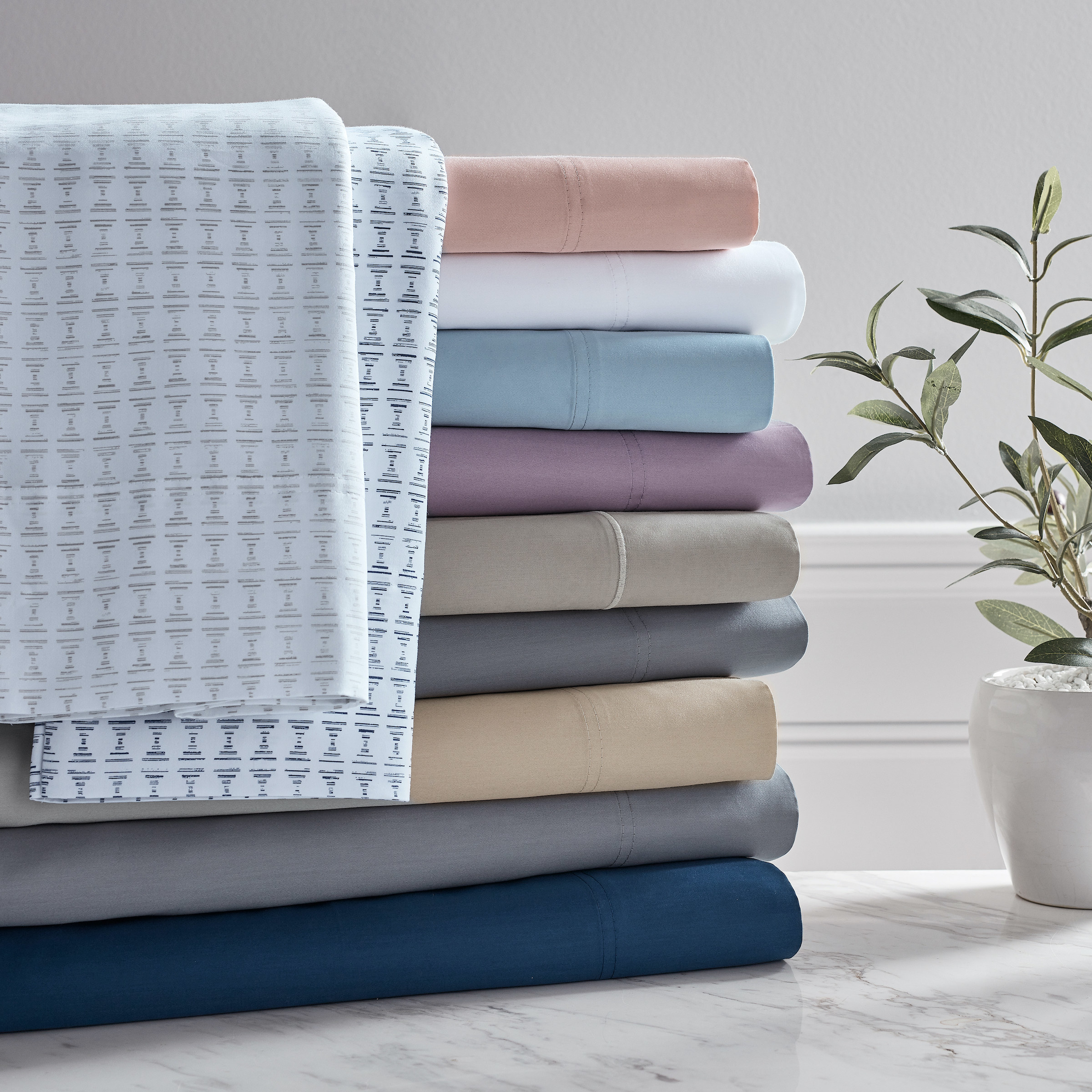 different colored sheets stacked on display