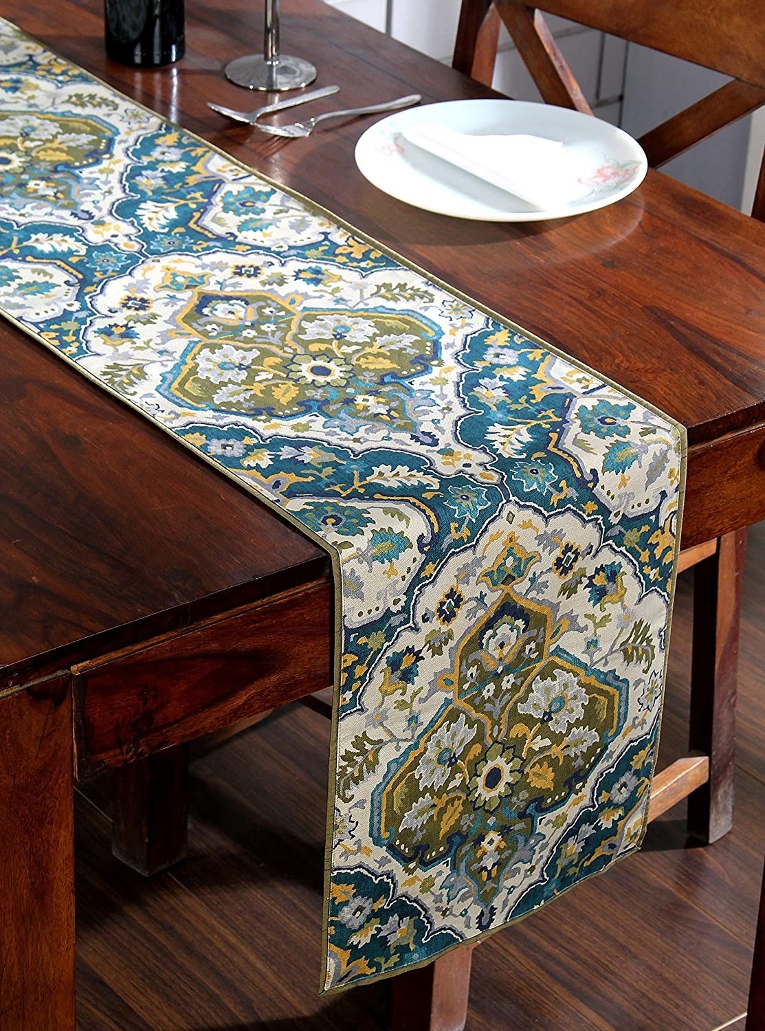A floral table runner on a table