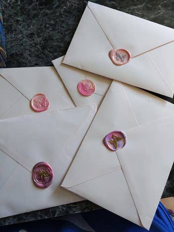 envelopes with wax seals on them