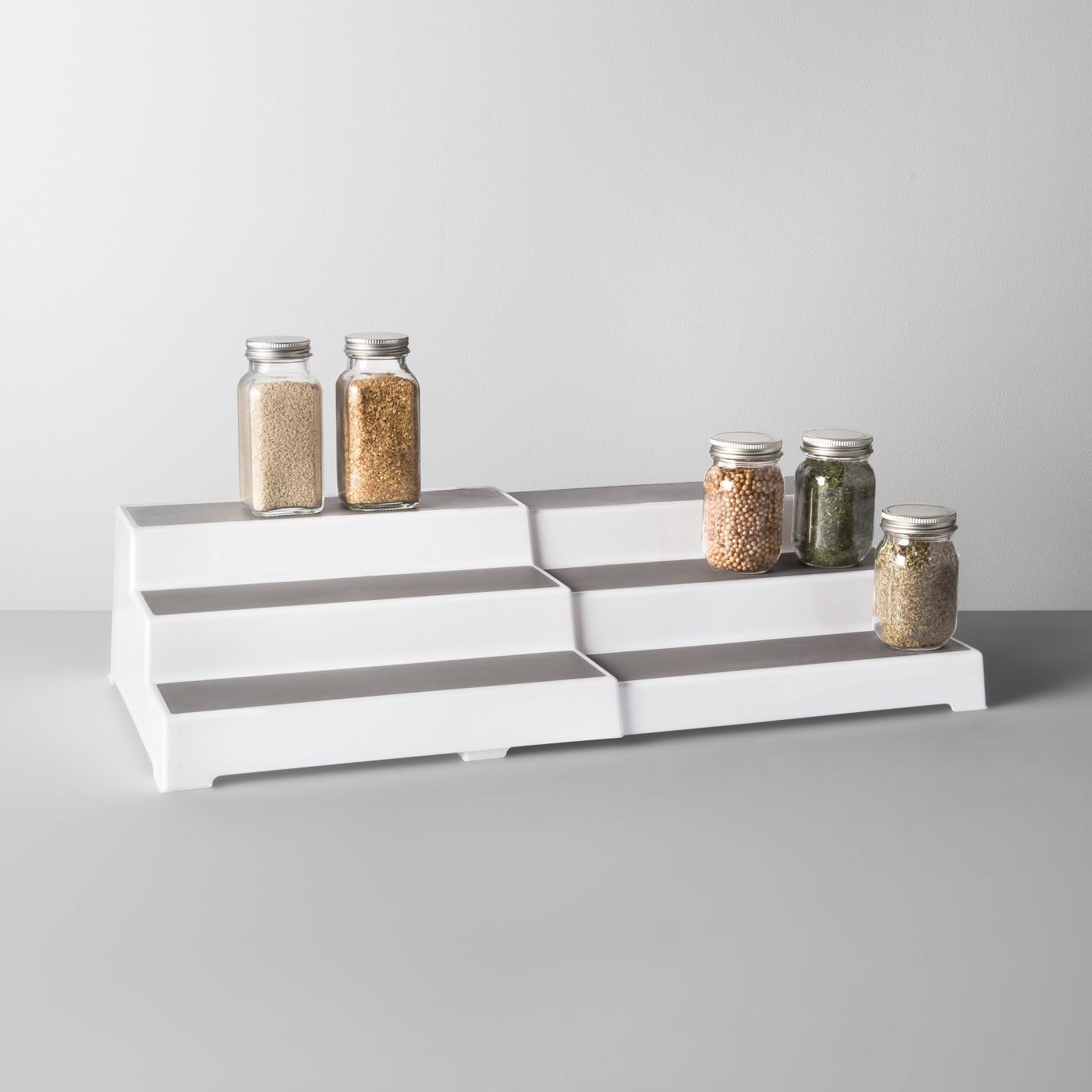 An image of a three-tier expandable shelf