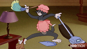Gif of Tom from &quot;Tom and Jerry&quot; cleaning a room