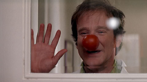 Robin Williams wearing a rubber clown nose in &quot;Patch Adams&quot;