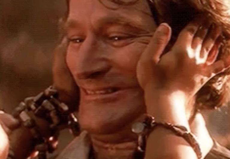 One of the lost boys putting a smile on Robin Williams&#x27; face in &quot;Hook&quot;