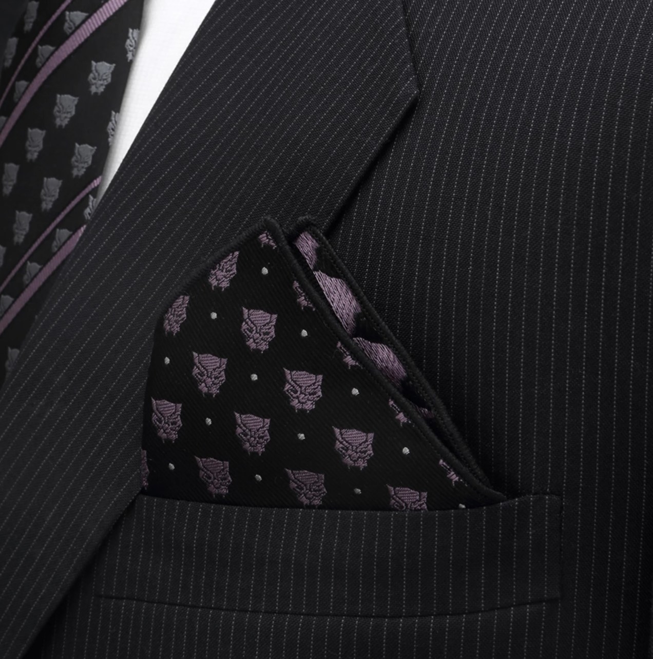 the pocket square with purple black panthers in a coat pocket