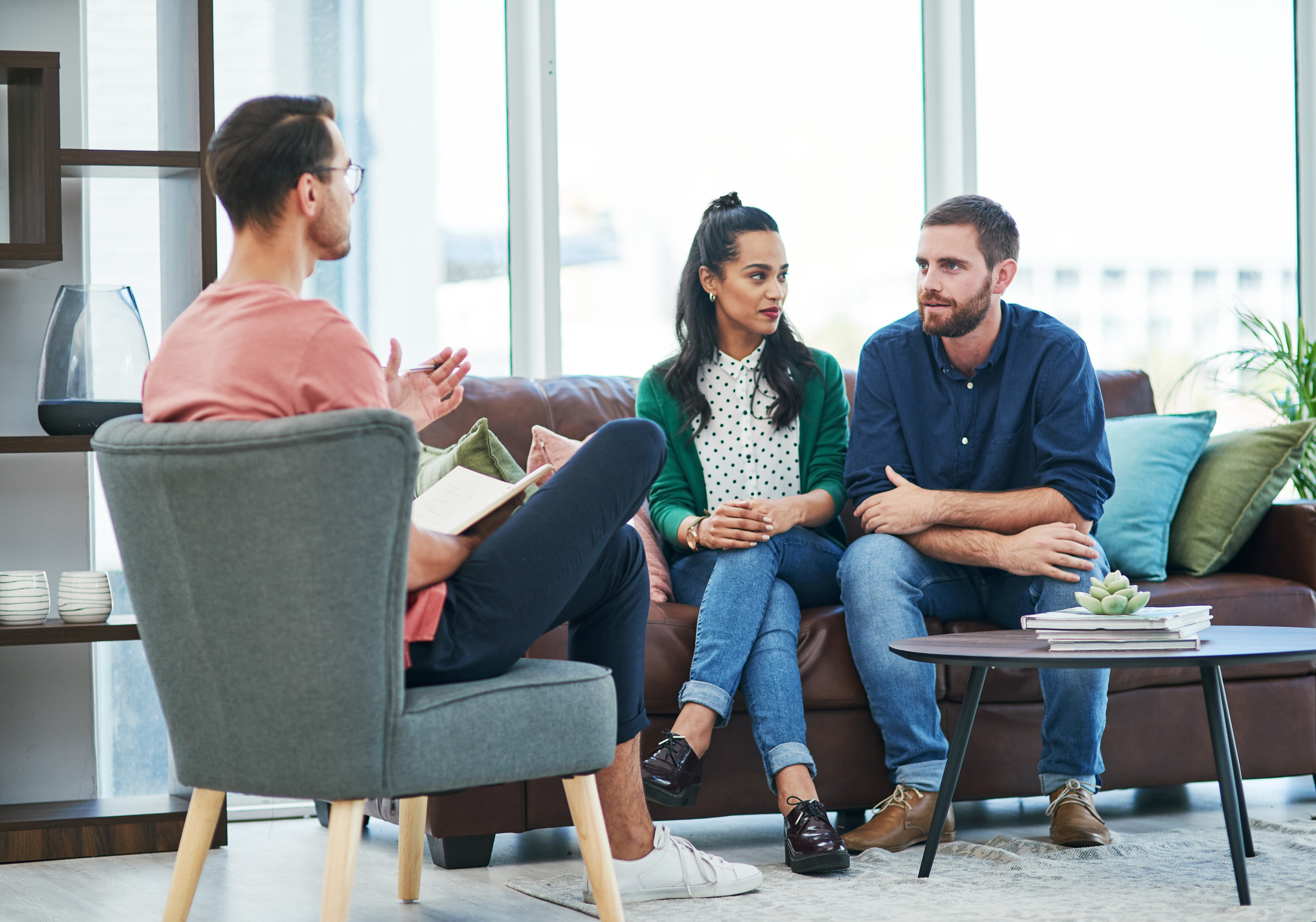 Couple talking with a counselor