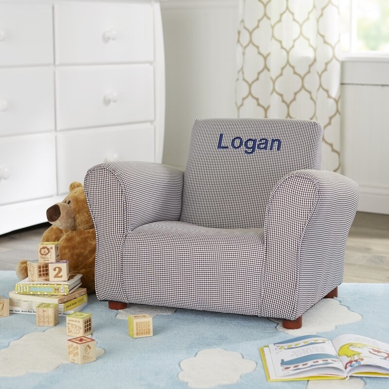 An image of a personalized kids club chair inside a room