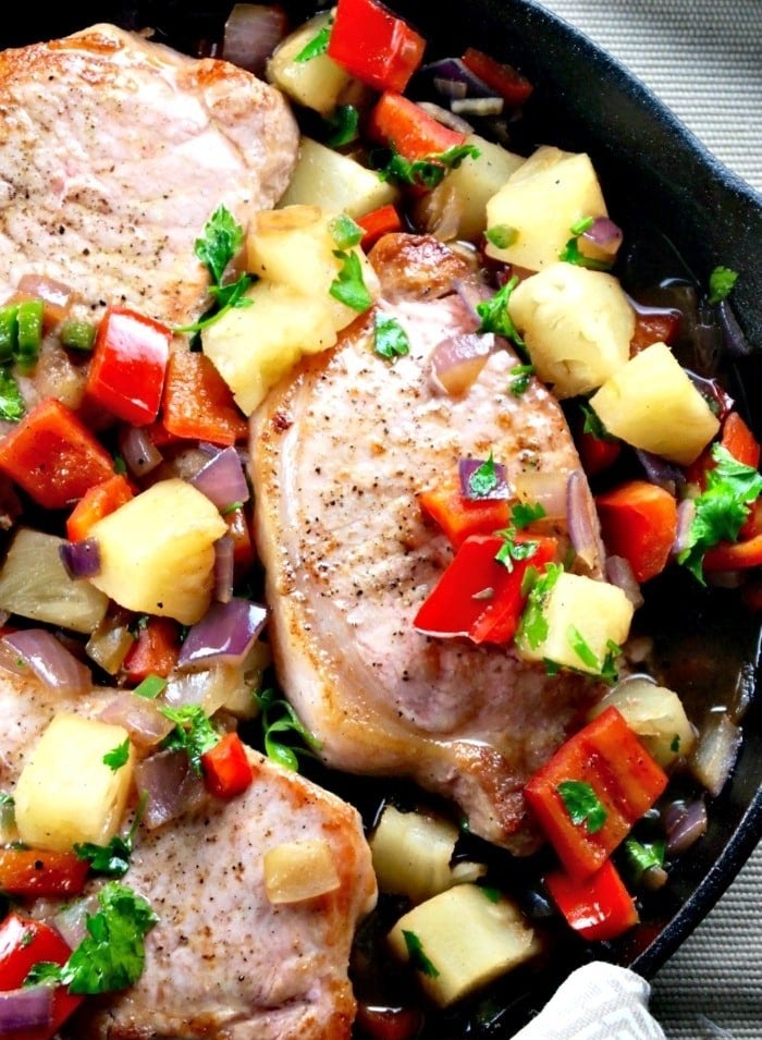 Sweet and sour skillet pork chops with pineapple, pepper, and onion