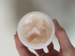 Reviewer's photo showing the collagen cream in a jar