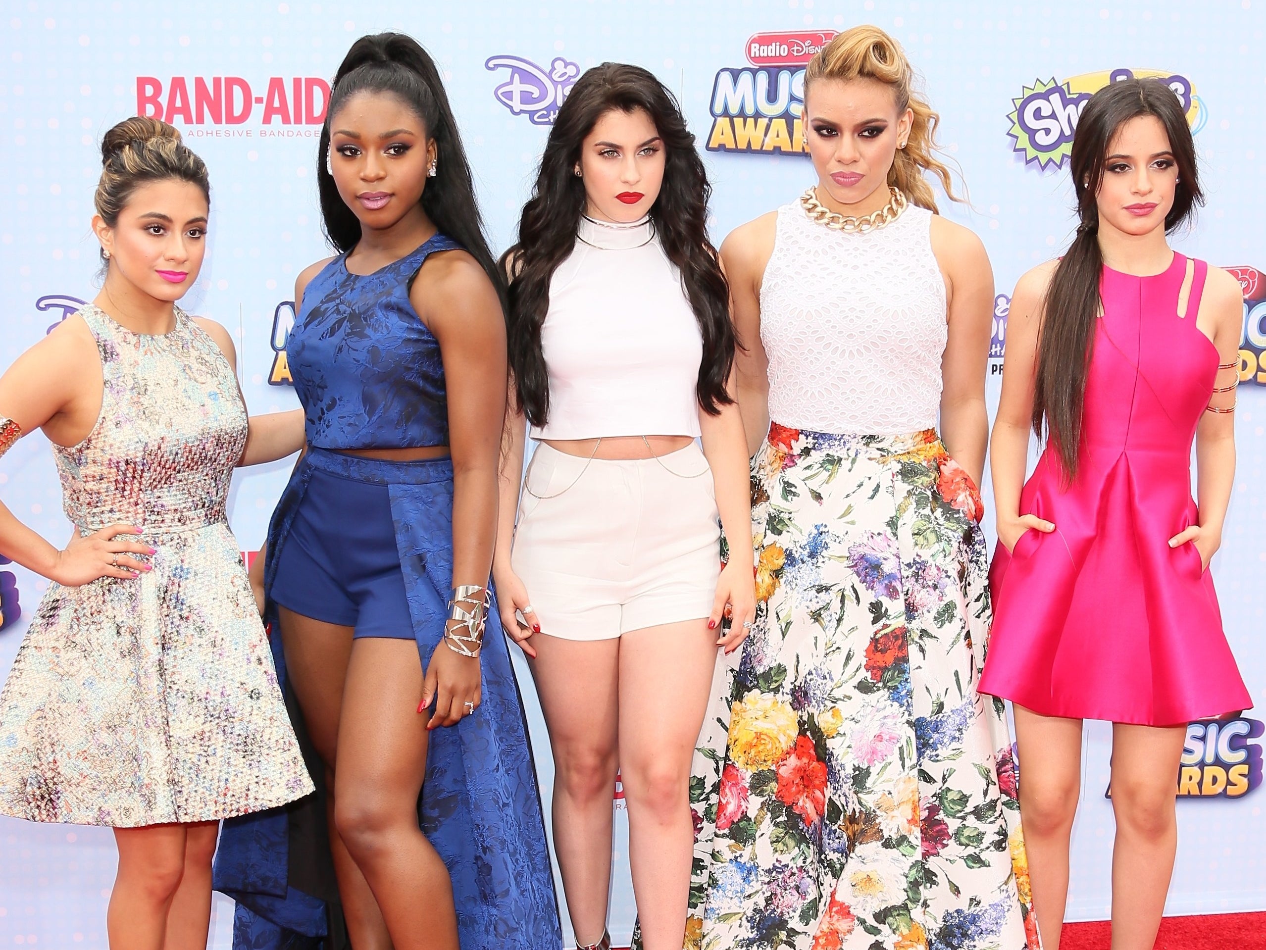 Normani poses with the rest of Fifth Harmony