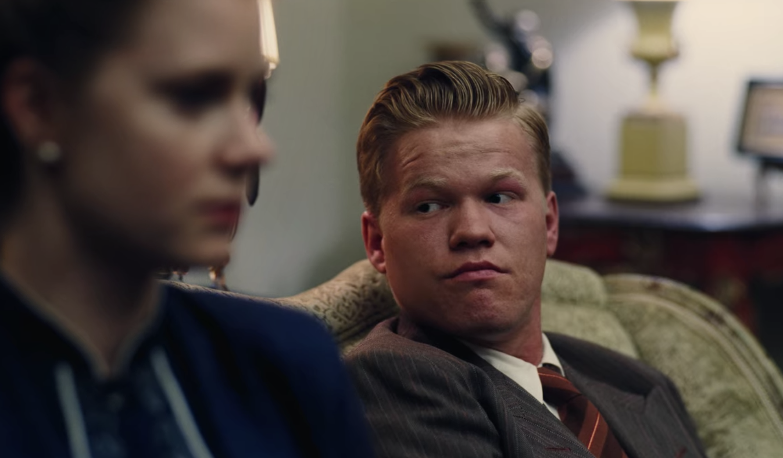 Jesse Plemons sitting next to Amy Adams in &quot;The Master&quot;