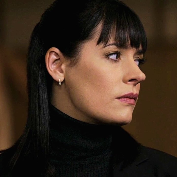 Emily Prentiss looks to the side
